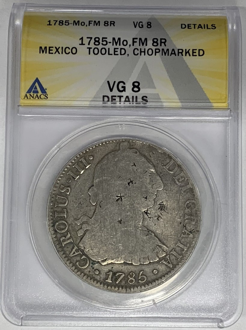 1785 Mexico Silver 8 Reales ANACS VG 8 Details Chopmarked Coin: 1785 Mexico Silver 8 Reales ANACS VG 8 Details Chopmarked Coin This 1785-Mo, FM Mexico 8 Reales coin is certified by ANACS with a grade of VG 8 Details and is noted as chopmarked. Minted during the Co