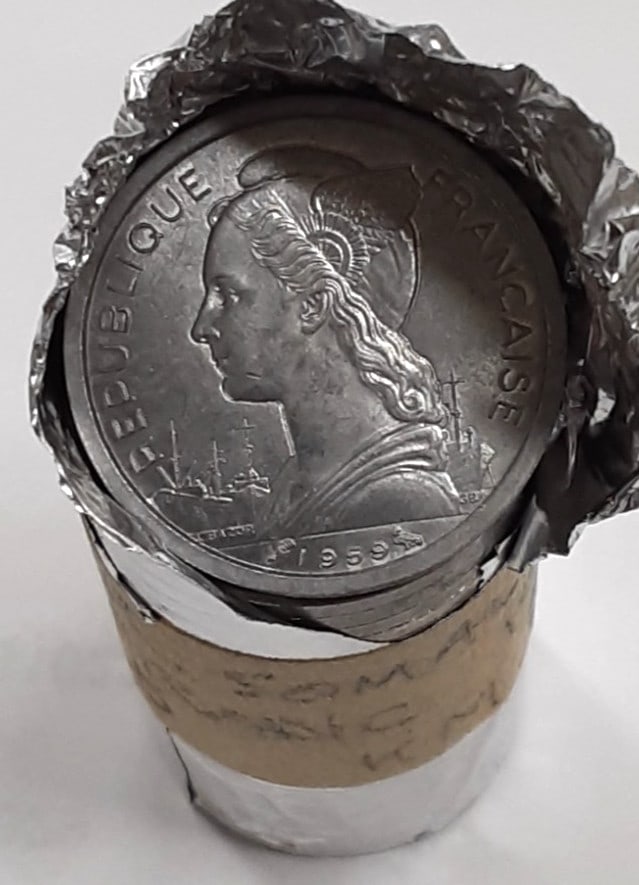 Roll of 35 BU French Somaliland 1 Franc Aluminum KM8 Coins in Wrapper: Roll of 35 BU French Somaliland 1 Franc Aluminum KM8 Coins in Wrapper This is a roll containing 25 uncirculated 1 Franc aluminum coins from French Somaliland, dated 1959 and identified as KM#8. The co