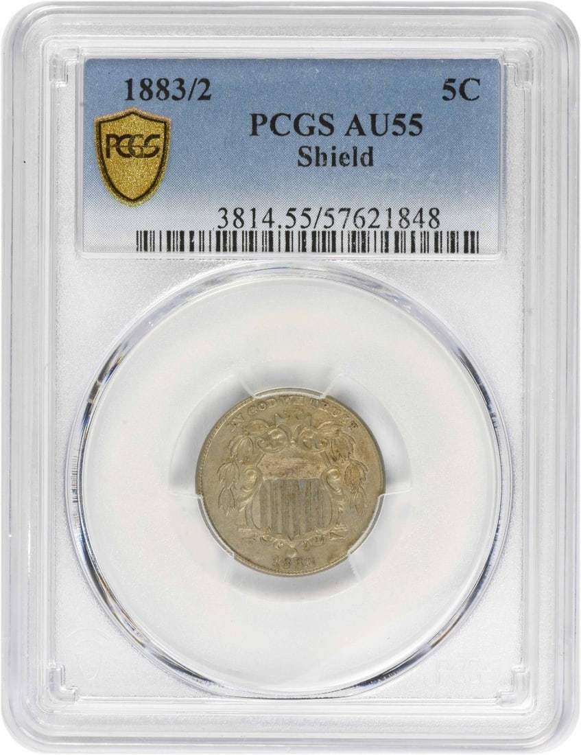 PCGS AU55 1883 Over 2 Shield Nickel Five Cent Philadelphia: PCGS AU55 1883 Over 2 Shield Nickel Five Cent Philadelphia This 1883/2 Shield Nickel has been graded AU55 by PCGS. Minted in Philadelphia, it features the classic Shield design by James Barton Longacr
