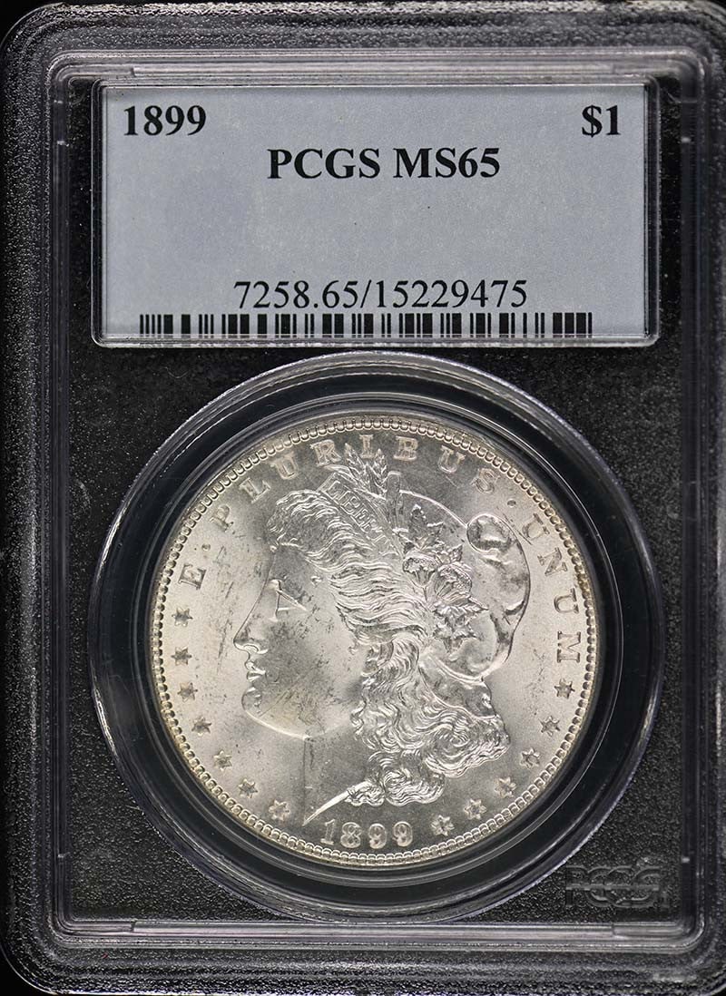1899 Morgan Dollar PCGS MS65 Uncirculated Philadelphia Mint: 1899 Morgan Dollar PCGS MS65 Uncirculated Philadelphia Mint This 1899 $1 Morgan Dollar is a stunning example of American coinage, certified by PCGS with a grade of MS65, indicating its uncirculated co
