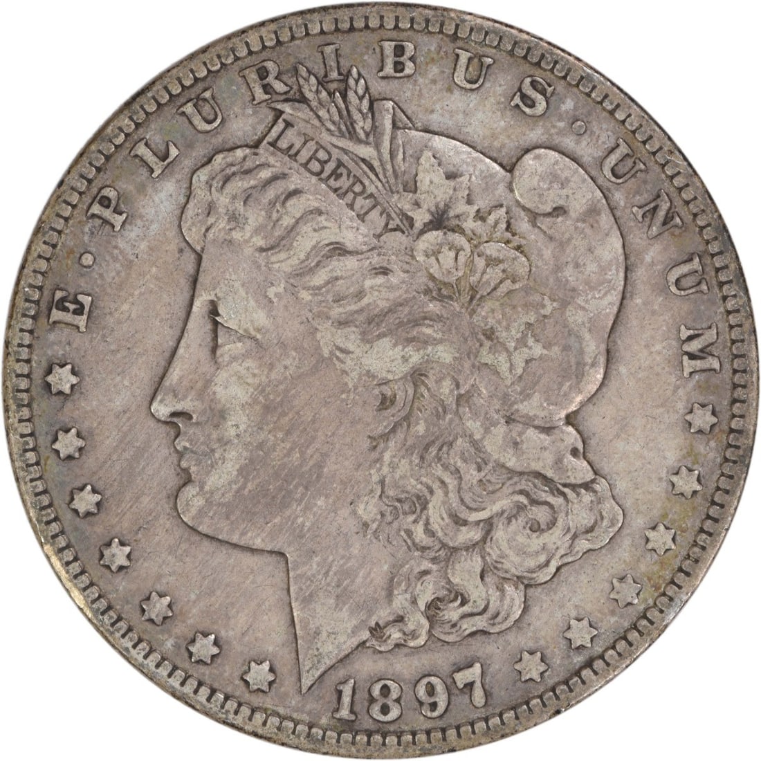 Morgan Dollar 1897-O Extra Fine Uncertified US Silver Coin: Morgan Dollar 1897-O Extra Fine Uncertified US Silver Coin This 1897-O Morgan Silver Dollar is a circulated coin from the New Orleans Mint and features a composition of 90% silver and 10% copper. Grad