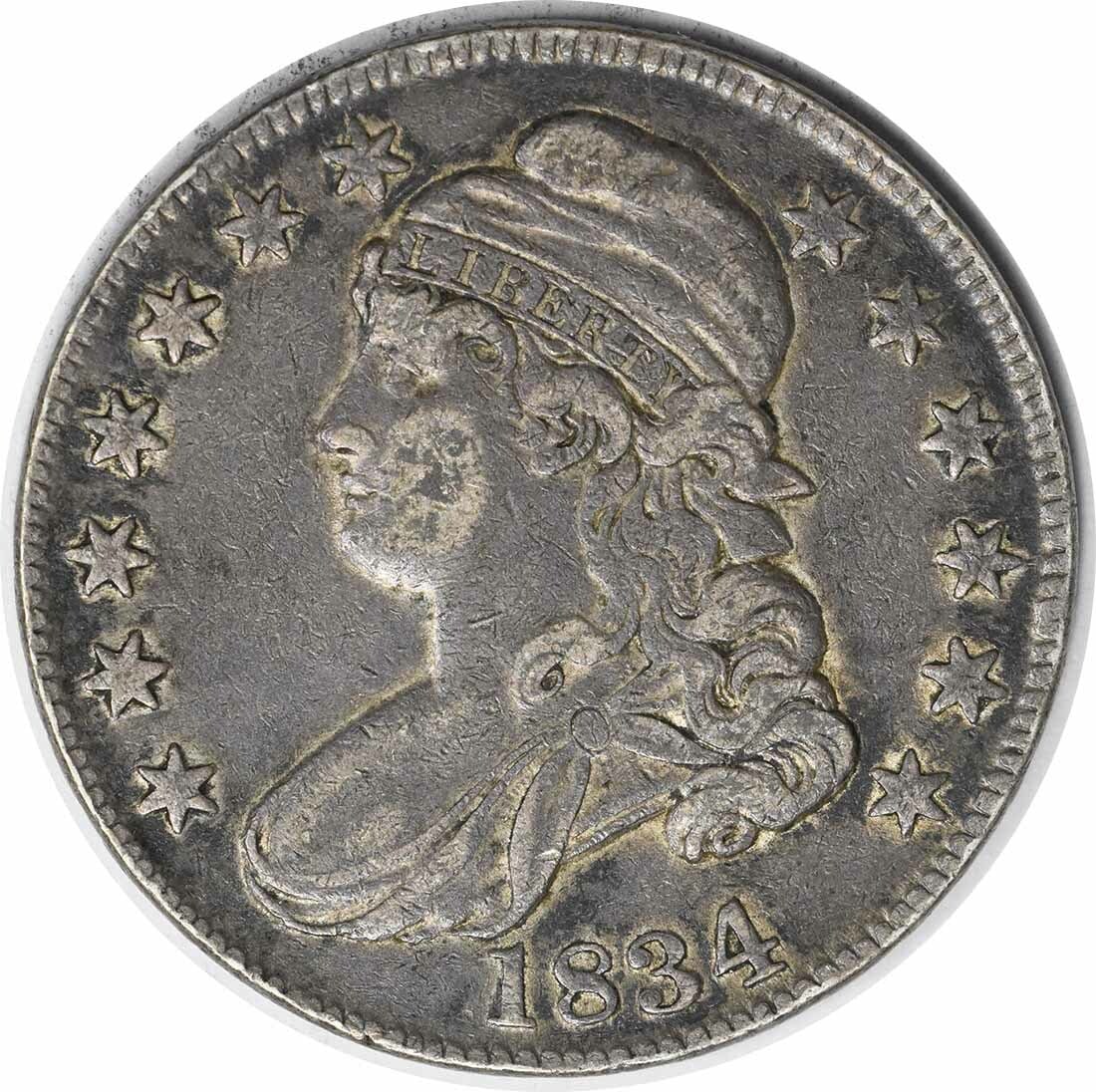 1834 Large Date Small Letters Bust Half Dollar Philadelphia Uncertified: 1834 Large Date Small Letters Bust Half Dollar Philadelphia Uncertified This is an 1834 Bust Half Dollar featuring the Large Date and Small Letters variety. The coin is circulated, uncertified, and gr