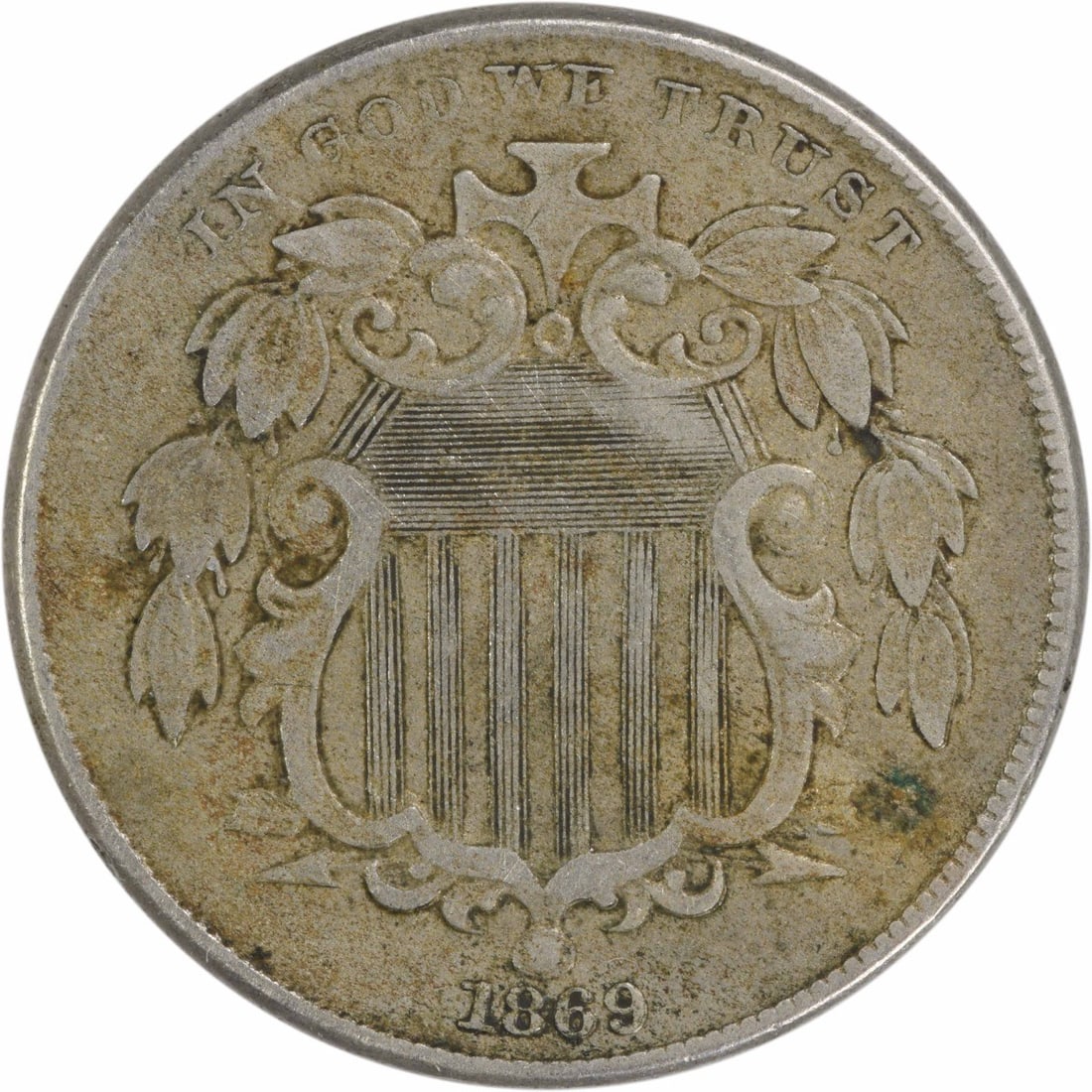 1869 Shield Nickel EF Uncertified 5C Philadelphia Mint: 1869 Shield Nickel EF Uncertified 5C Philadelphia Mint This 1869 Shield Nickel is a piece of U.S. history, originating from the Philadelphia mint. Featuring a denomination of 5 cents, this coin is cla