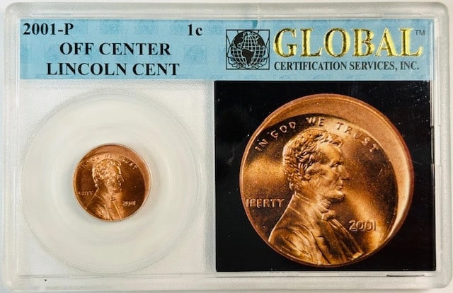 2001 Philadelphia Off Center Lincoln Cent in Global Holder: 2001 Philadelphia Off Center Lincoln Cent in Global Holder This 2001 P Lincoln Memorial penny features an off-center strike and is composed of copper. The coin is housed in a global holder and origina