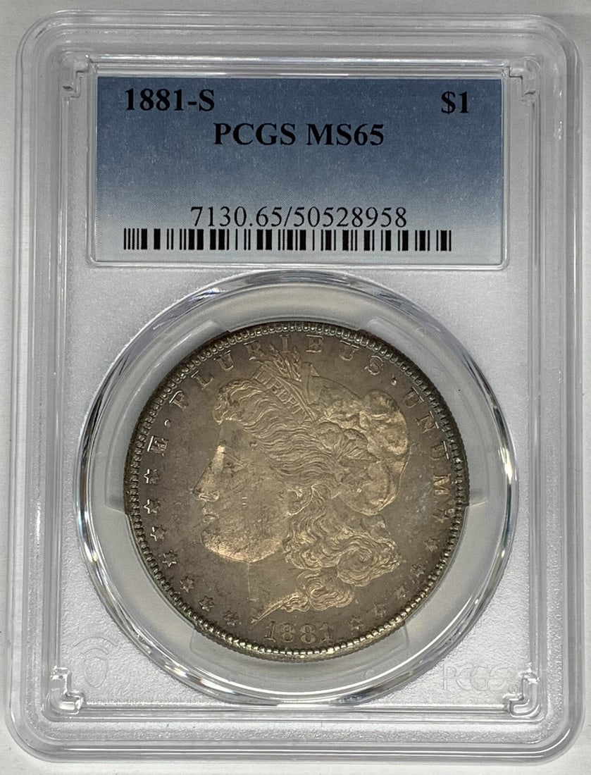 PCGS MS 65 1881-S Morgan Dollar with Toned Silver Finish: PCGS MS 65 1881-S Morgan Dollar with Toned Silver Finish This is an 1881-S Morgan Silver Dollar featuring natural toning. The coin is uncirculated and has been graded MS 65 by PCGS. It is composed of 