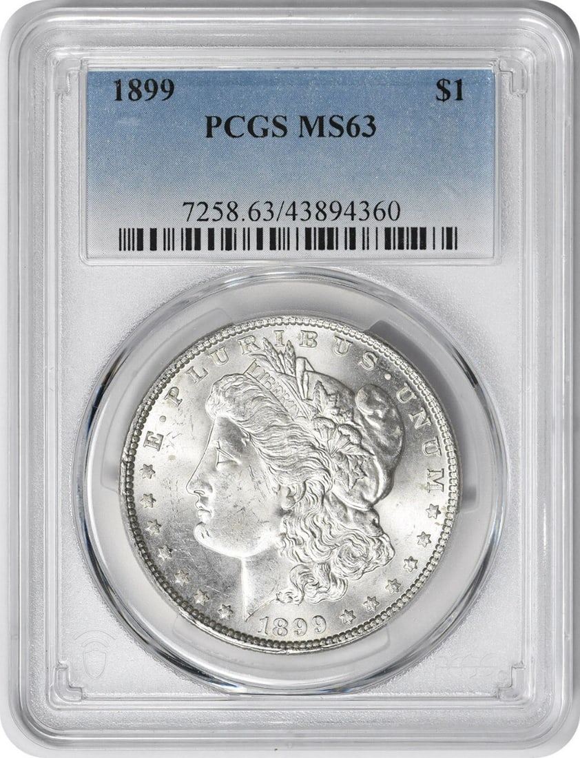 1899 Morgan Silver Dollar MS63 PCGS Uncirculated Coin: 1899 Morgan Silver Dollar MS63 PCGS Uncirculated Coin This 1899 Morgan Silver Dollar, graded MS63 by PCGS, is a stunning example of American coinage. Featuring a 90% silver and 10% copper composition,