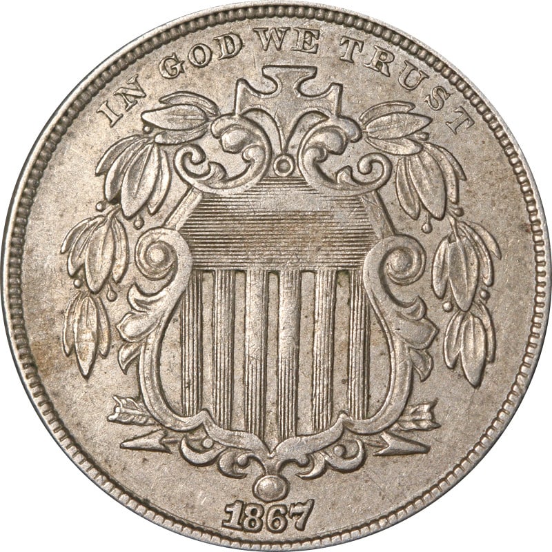 1867 United States Shield Nickel Circulated Coin: 1867 United States Shield Nickel Circulated Coin This is an 1867 Shield Nickel from the United States. The coin is composed of nickel and is in circulated, pre-owned condition. It is uncertified. Spec