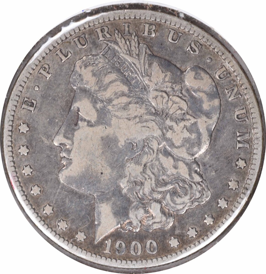 1900-O Morgan Silver Dollar VF Uncertified 90% Silver Coin: 1900-O Morgan Silver Dollar VF Uncertified 90% Silver Coin This 1900-O/CC Morgan Silver Dollar showcases a striking design by George T. Morgan and is a notable piece from the New Orleans mint. The coi