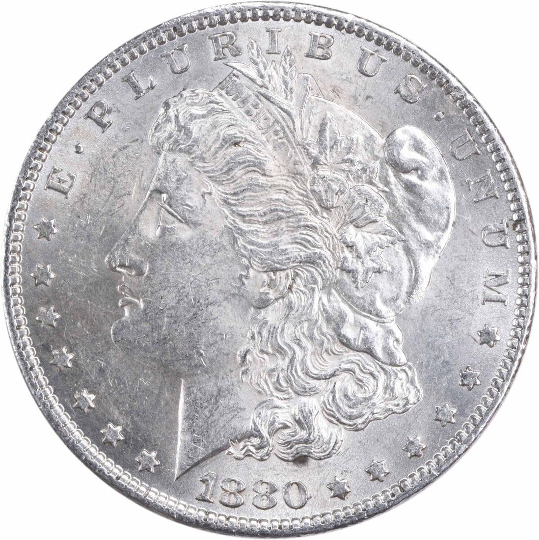Uncirculated 1880-O Morgan Dollar Silver Coin Brilliant Uncertified: Uncirculated 1880-O Morgan Dollar Silver Coin Brilliant Uncertified This is an 1880-O Morgan Silver Dollar from the United States, featuring a brilliant uncirculated (BU) grade. The coin is composed o