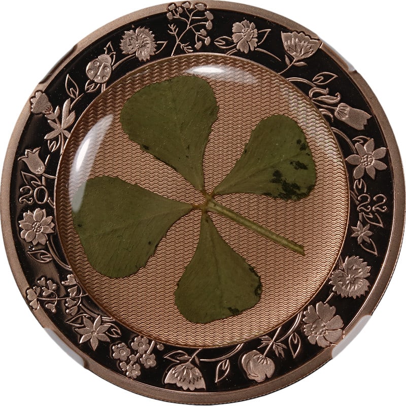 2022 Palau Silver Five Dollar Gilt Four Leaf Clover Coin NGC MS70: 2022 Palau Silver Five Dollar Gilt Four Leaf Clover Coin NGC MS70 This 2022 Palau $5 coin features 1 ounce of 0.999 fine silver with a gilt four-leaf clover design, symbolizing good luck. Graded MS70 