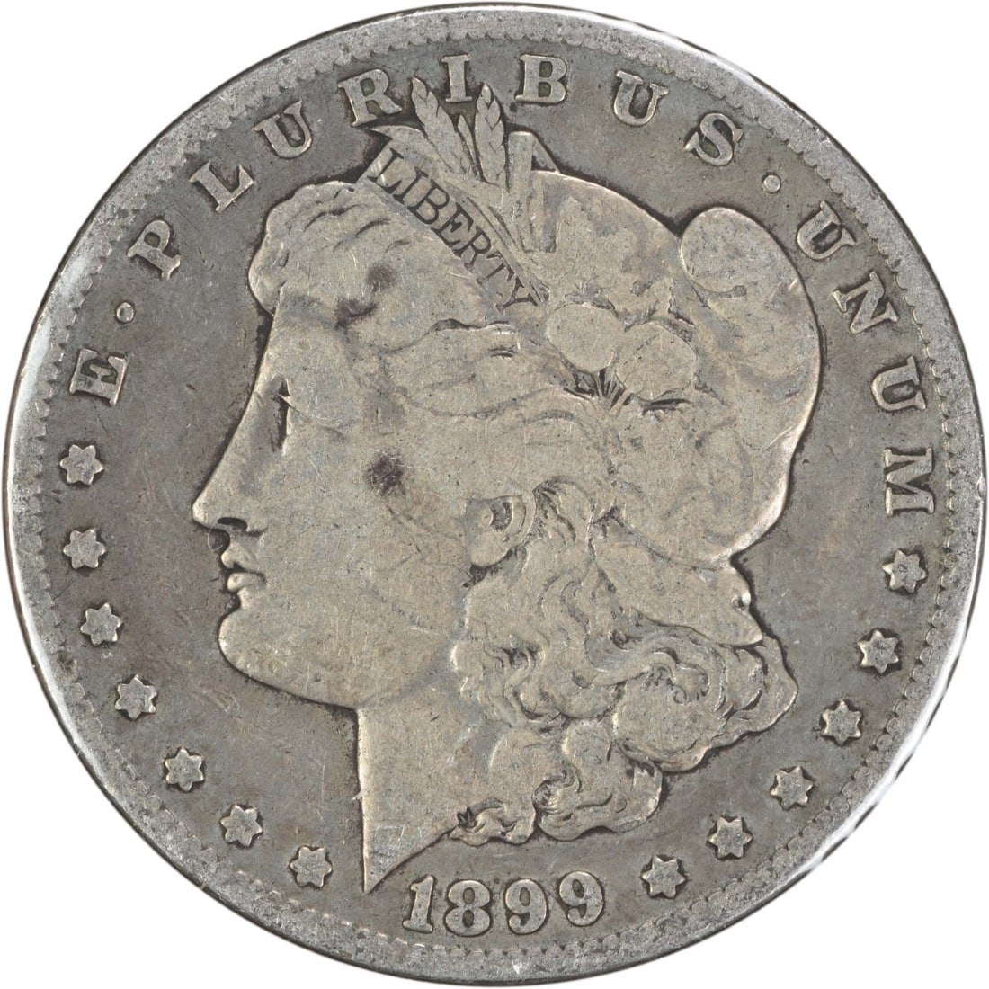 1899 Morgan Silver Dollar VAM 31 VG Uncertified 90% Silver: 1899 Morgan Silver Dollar VAM 31 VG Uncertified 90% Silver This 1899 VAM 31 Morgan Silver Dollar features a micro 'O' mint mark, signifying its production at the New Orleans Mint. The coin is made of 