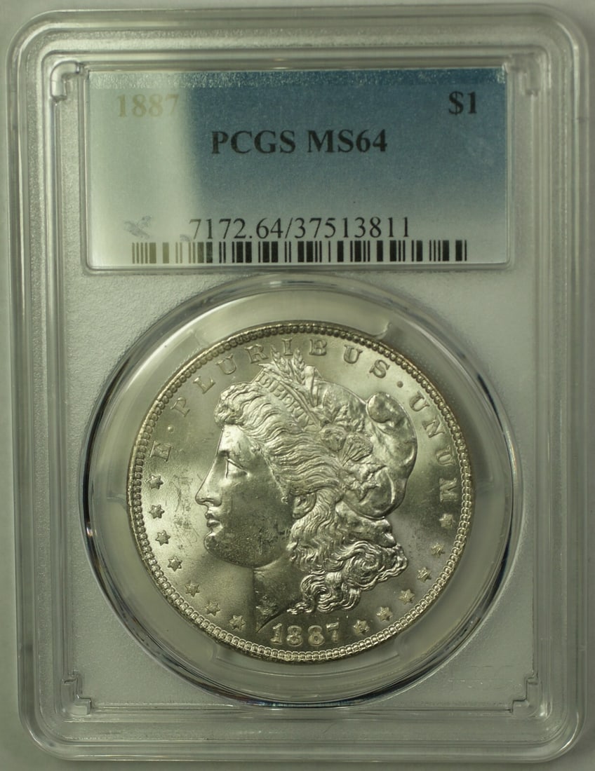 PCGS MS-64 Morgan Dollar 1887 Silver Coin Reverse Struck Through Foil Error: PCGS MS-64 Morgan Dollar 1887 Silver Coin Reverse Struck Through Foil Error This is an 1887 Morgan Silver Dollar $1 coin graded MS-64 by PCGS. Struck at the Philadelphia Mint, this uncirculated coin f