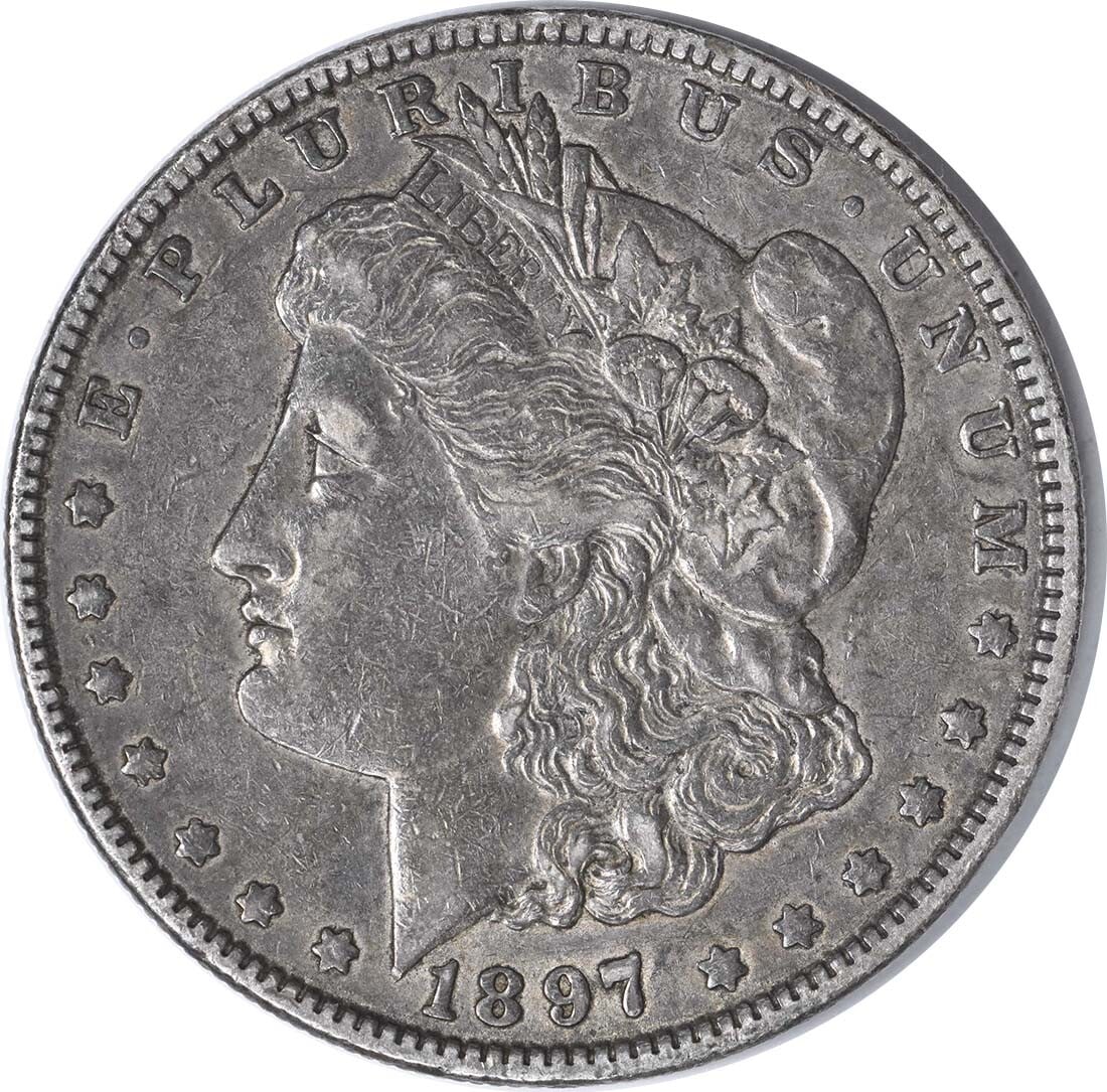 1897-O Morgan Silver Dollar $1 Uncertified by George T. Morgan: 1897-O Morgan Silver Dollar $1 Uncertified by George T. Morgan This 1897-O Morgan Silver Dollar is a remarkable piece of numismatic history. Struck in 1897 at the New Orleans Mint, this coin features 