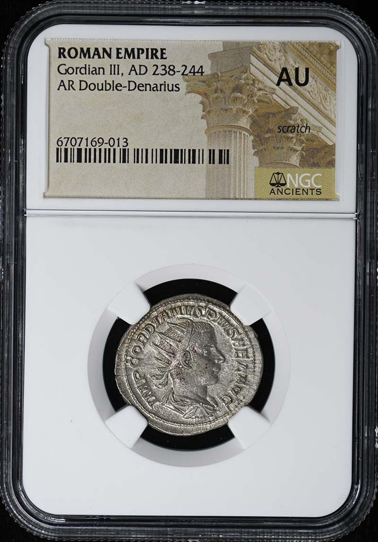 NGC AU50 Roman Double Denarius Coin of Gordian III: NGC AU50 Roman Double Denarius Coin of Gordian III This is a Roman Empire AR Double-Denarius struck during the reign of Gordian III, who ruled from AD 238 to 244. The coin has been certified by NGC wi