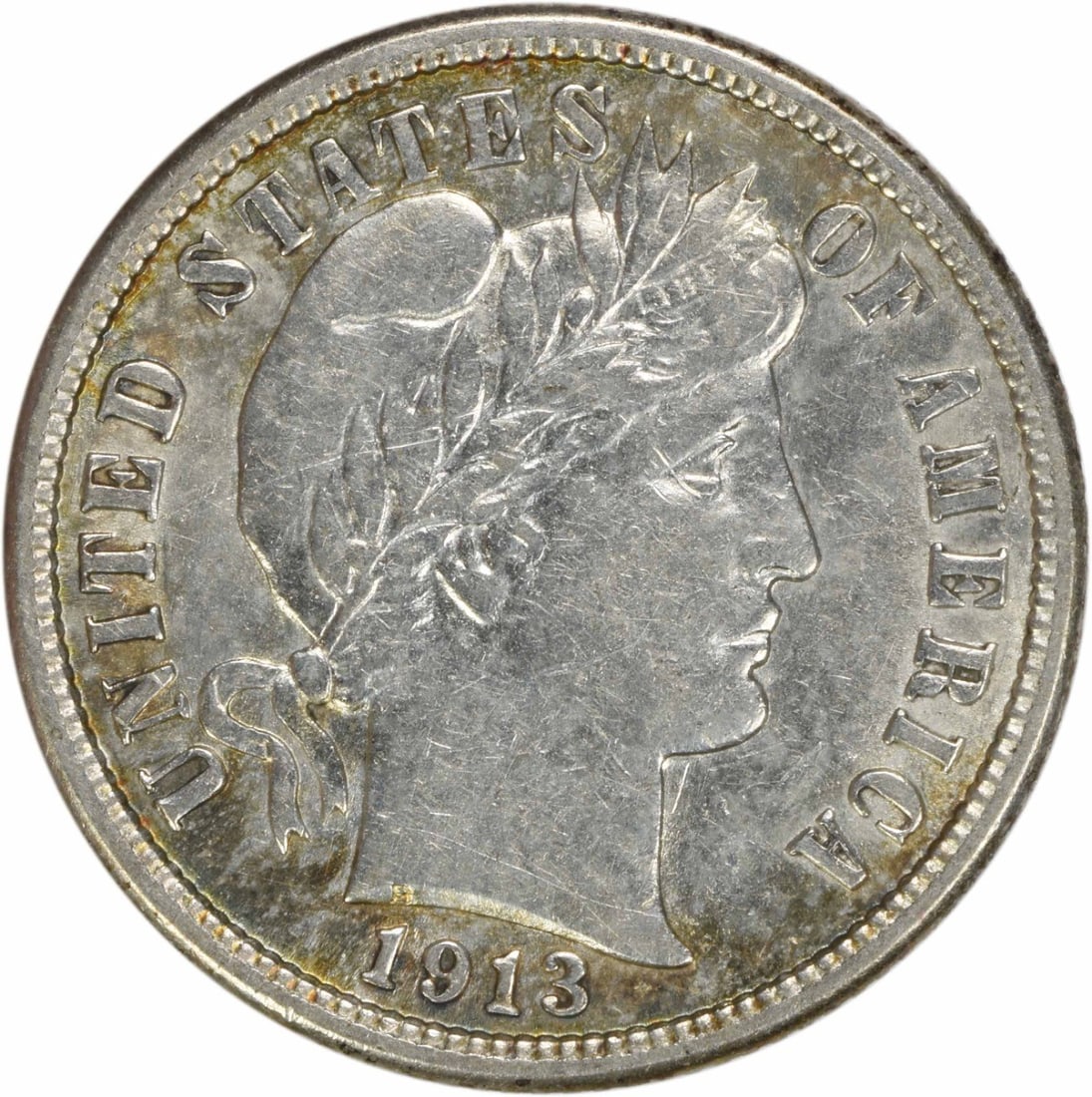 1913 Barber Silver Dime AU Uncertified 10C Philadelphia Mint: 1913 Barber Silver Dime AU Uncertified 10C Philadelphia Mint This 1913 Barber Silver Dime is a beautifully preserved piece of American history, featuring a design by Charles E. Barber. The coin, which