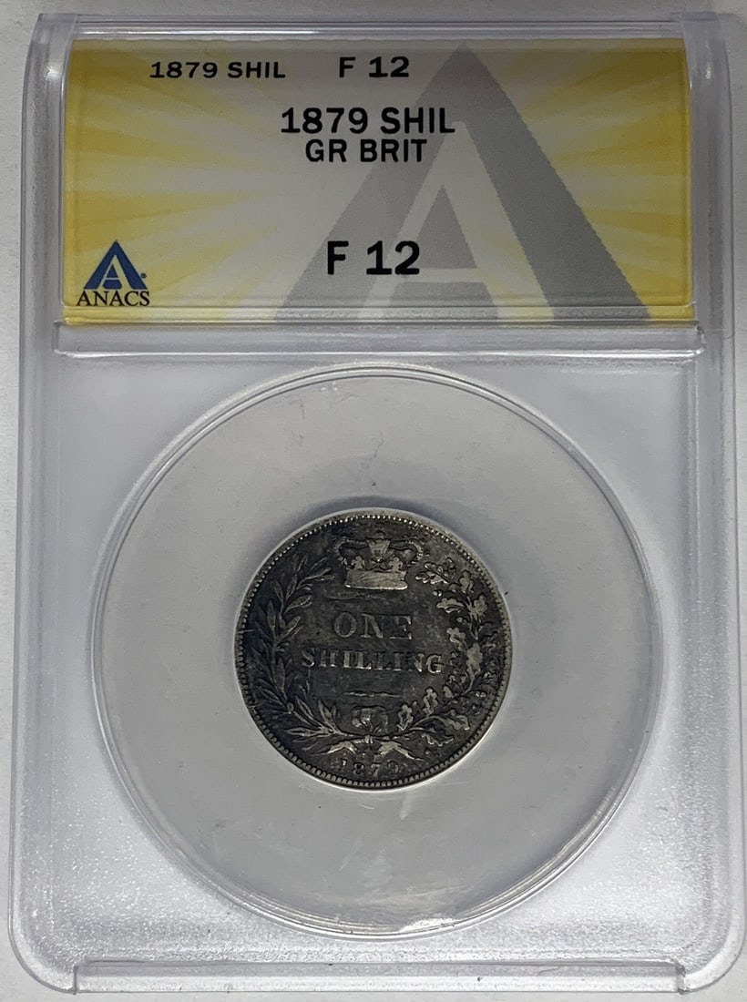 ANACS F 12 Certified 1879 United Kingdom Shilling Coin: ANACS F 12 Certified 1879 United Kingdom Shilling Coin This 1879 Great Britain Shilling is graded F 12 by ANACS. Issued in the United Kingdom, this pre-owned coin features the denomination of one shil