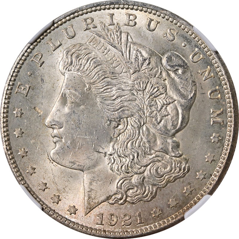 1921 Philadelphia Morgan Dollar Silver NGC MS63 With Toned Surfaces: 1921 Philadelphia Morgan Dollar Silver NGC MS63 With Toned Surfaces This 1921-P Morgan Silver Dollar is graded MS63 by NGC and features attractive toning. Struck in 0.9 fine silver at the Philadelphia