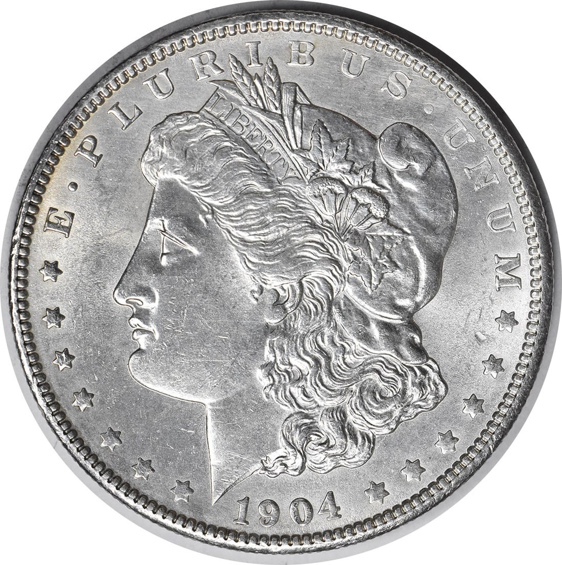 1904 Silver Dollar Morgan Coin Choice BU Uncertified No Mint Mark: 1904 Silver Dollar Morgan Coin Choice BU Uncertified No Mint Mark This 1904 Morgan Silver Dollar is an uncirculated coin graded as Choice BU. It is composed of silver and was minted in the United Stat