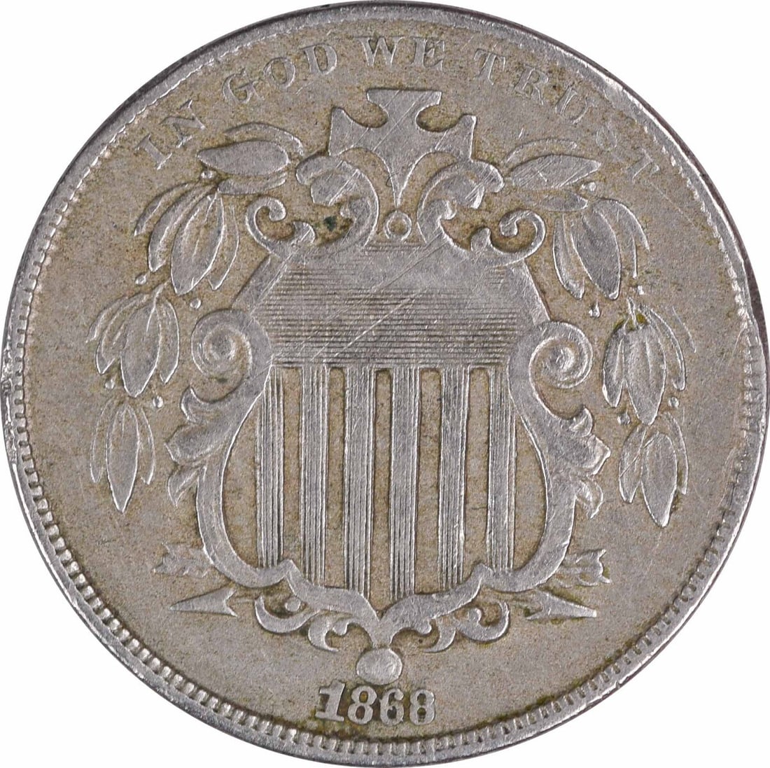 1868 Shield Nickel 5C XF Uncertified Philadelphia Coin: 1868 Shield Nickel 5C XF Uncertified Philadelphia Coin This 1868 Shield Nickel is a remarkable piece of numismatic history, featuring the intricate design by James Barton Longacre. Minted in Philadelp