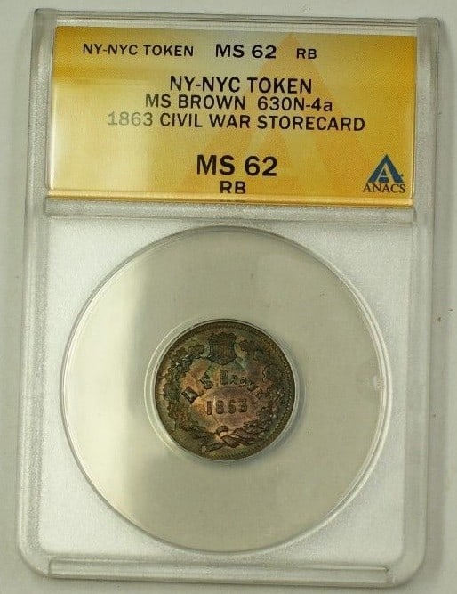 ANACS MS-62 RB 1863 NY-NYC Civil War Storecard 630N-4a Late Die State: ANACS MS-62 RB 1863 NY-NYC Civil War Storecard 630N-4a Late Die State This is an 1863 New York City Civil War store card, cataloged as 630N-4a, featuring a brown finish. Graded by ANACS as MS-62 RB, t