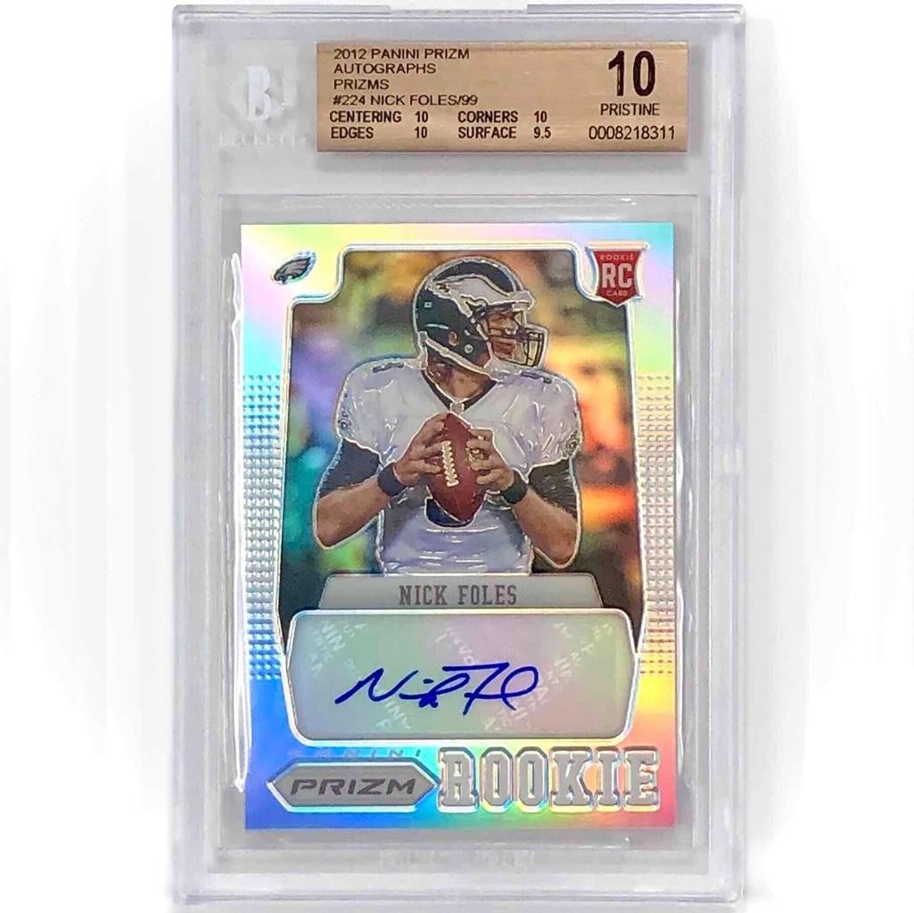 2012 Panini Prizm Nick Foles RC Autographed Silver Holo /99 BGS 10: 2012 Panini Prizm Nick Foles RC Autographed Silver Holo /99 BGS 10 This 2012 Panini Prizm Nick Foles rookie card is a stunning sports collectible that features a Silver Holo finish. Graded at BGS 10, 
