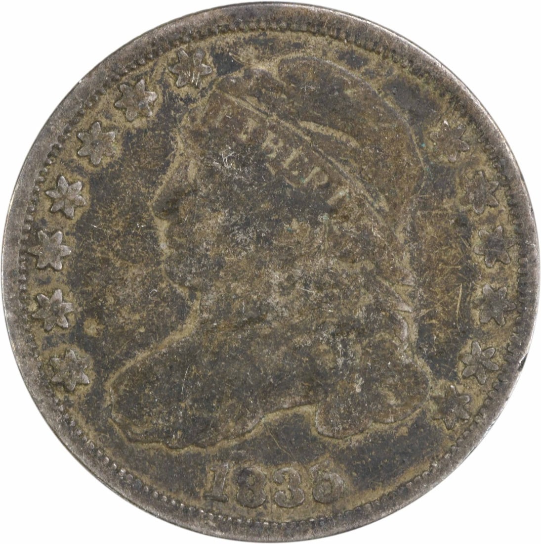1835 Capped Bust Silver Dime 10C Philadelphia Uncertified: 1835 Capped Bust Silver Dime 10C Philadelphia Uncertified This 1835 Capped Bust Silver Dime is a remarkable piece of numismatic history, featuring a gorgeous design by John Reich. The coin is circulat