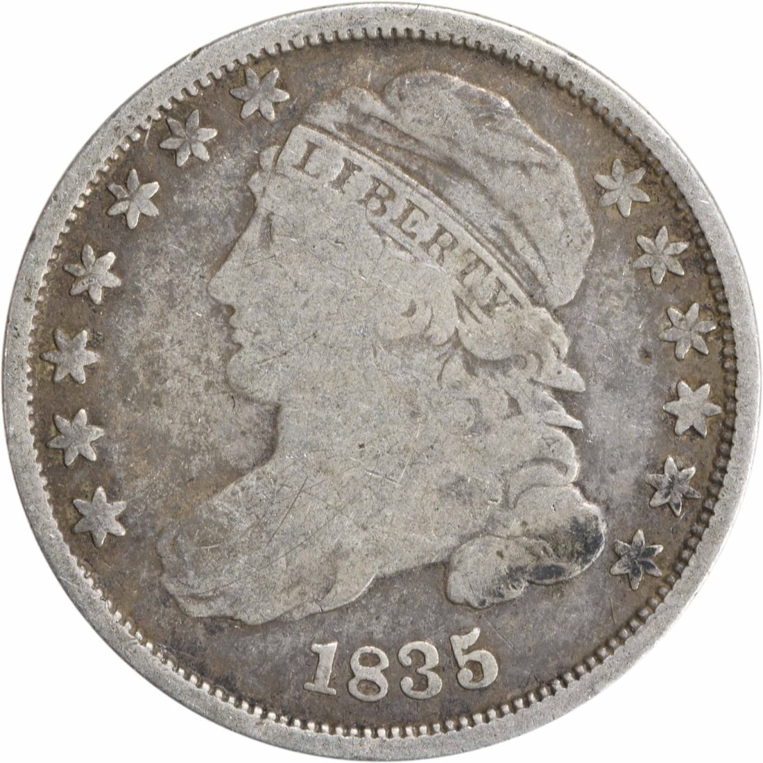 1835 Capped Bust Silver Dime 10C Philadelphia Mint VG Uncertified: 1835 Capped Bust Silver Dime 10C Philadelphia Mint VG Uncertified This 1835 Capped Bust Silver Dime is a remarkable piece of American numismatic history. Struck at the Philadelphia mint, this coin fea