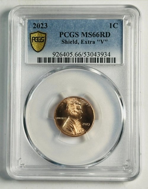 PCGS MS66 RD 2023 Lincoln Cent with Extra V Copper Uncirculated: PCGS MS66 RD 2023 Lincoln Cent with Extra V Copper Uncirculated This 2023 Lincoln Penny is graded MS-66 RD by PCGS and features the extra "V" variety. The coin is composed of copper, uncirculated, and