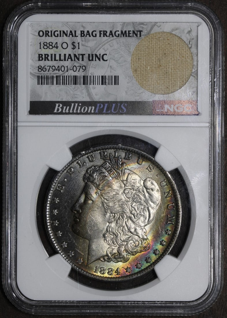 NGC Certified 1884-O Morgan Silver Dollar Rainbow Toning Uncirculated: NGC Certified 1884-O Morgan Silver Dollar Rainbow Toning Uncirculated This 1884-O Morgan Silver Dollar features a brilliant uncirculated appearance with striking rainbow toning. Minted in New Orleans,