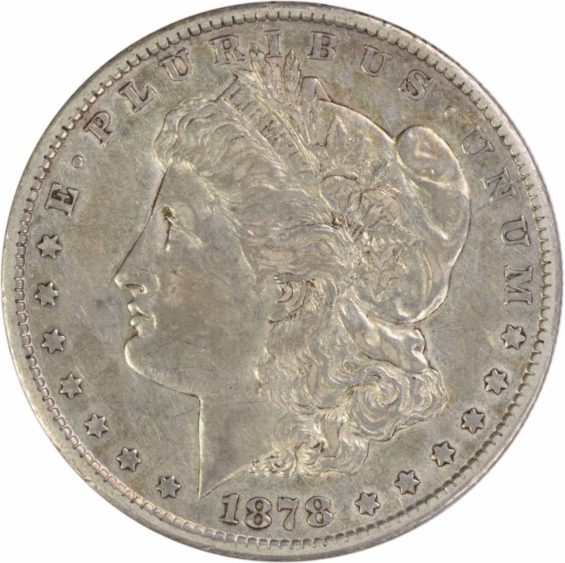 Carson City 1878 Morgan Dollar Extra Fine 90 Percent Silver Uncertified Coin: Carson City 1878 Morgan Dollar Extra Fine 90 Percent Silver Uncertified Coin This 1878-CC Morgan Silver Dollar is a pre-owned coin struck at the Carson City Mint. Composed of 90% silver and 10% copper