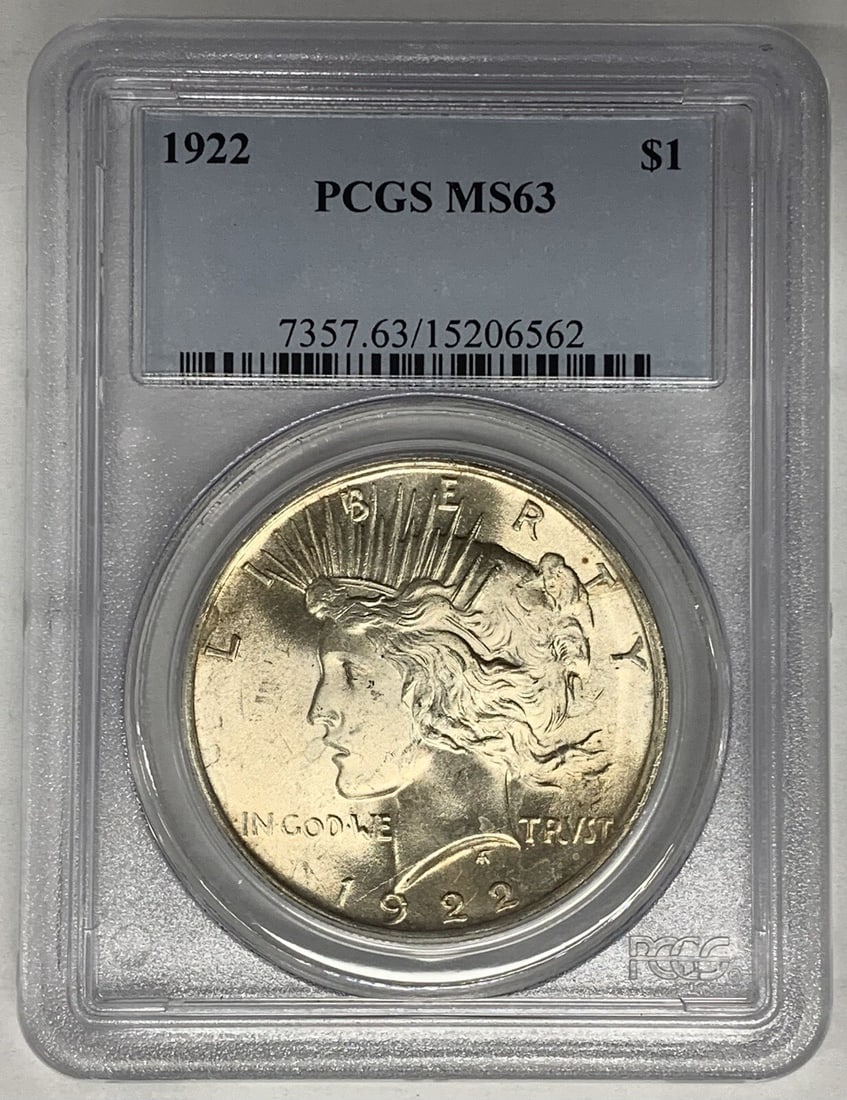 PCGS MS 63 Peace Dollar Silver Coin from 1922: PCGS MS 63 Peace Dollar Silver Coin from 1922 This is a 1922 Peace Silver Dollar coin from the United States, certified by PCGS with a grade of MS 63. The coin is uncirculated and composed of silver, 