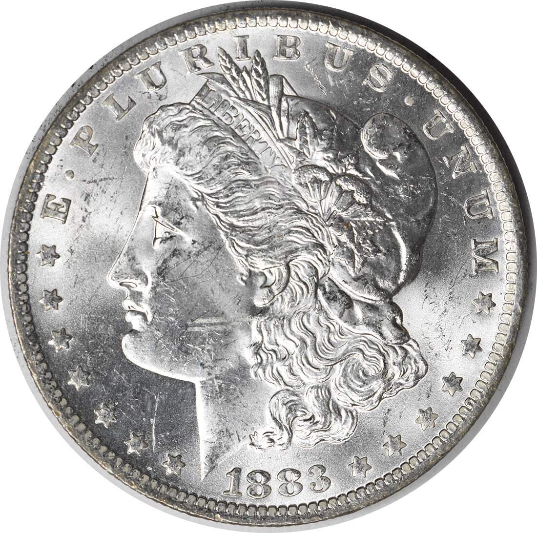 Choice BU 1883-O Silver Morgan Dollar with Attractive Toning Uncertified: Choice BU 1883-O Silver Morgan Dollar with Attractive Toning Uncertified This 1883-O Morgan Silver Dollar is a Choice Brilliant Uncirculated coin with attractive toning. It remains uncertified and is 