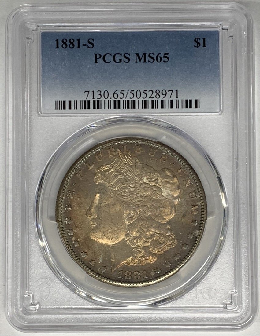 PCGS MS 65 1881-S Morgan Dollar Silver Coin With Toning: PCGS MS 65 1881-S Morgan Dollar Silver Coin With Toning This 1881-S Morgan Silver Dollar is a collectible coin from the United States, featuring attractive toning. It is composed of silver, has a deno