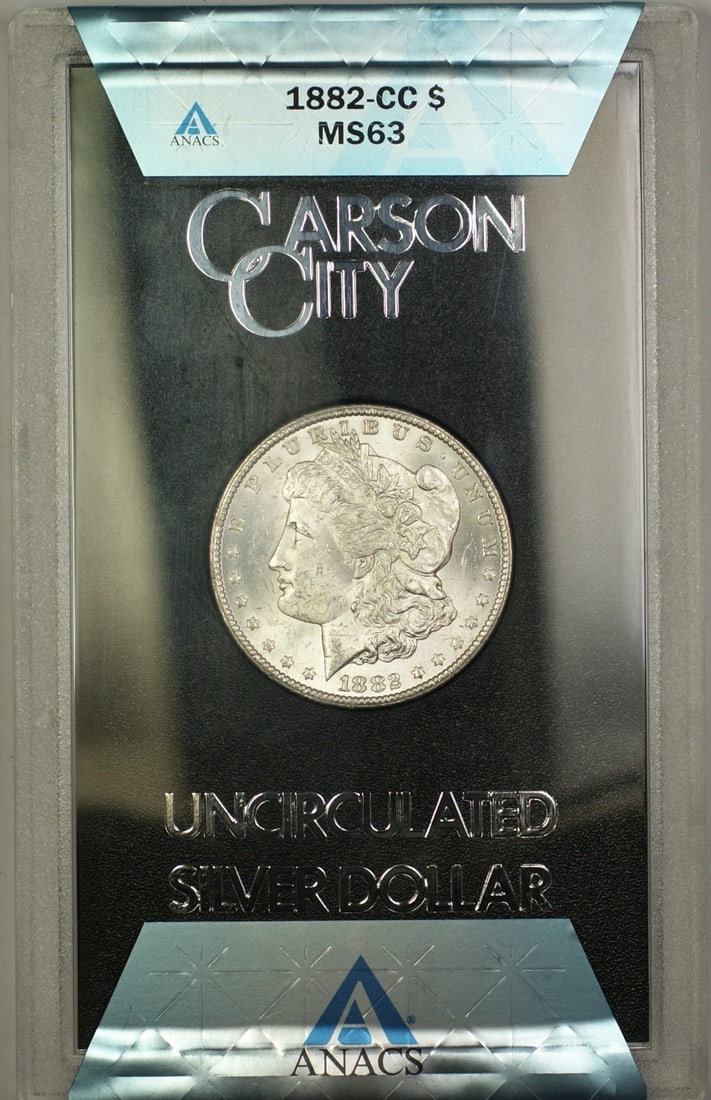 1882 Carson City Morgan Dollar ANACS MS63 GSA Hoard in Box with COA: 1882 Carson City Morgan Dollar ANACS MS63 GSA Hoard in Box with COA This 1882-CC Morgan Silver Dollar is part of the GSA Hoard and has been certified by ANACS with a grade of MS-63. Minted in Carson C