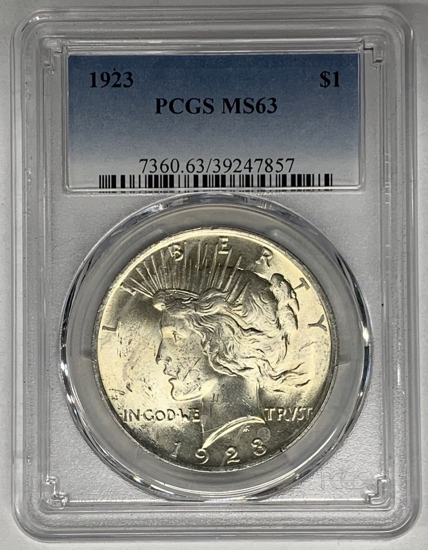 PCGS MS 63 Certified 1923 Peace Silver Dollar Uncirculated Coin: PCGS MS 63 Certified 1923 Peace Silver Dollar Uncirculated Coin This 1923 Peace Silver Dollar coin is graded MS 63 by PCGS and is composed of silver. It is uncirculated and certified, originating from