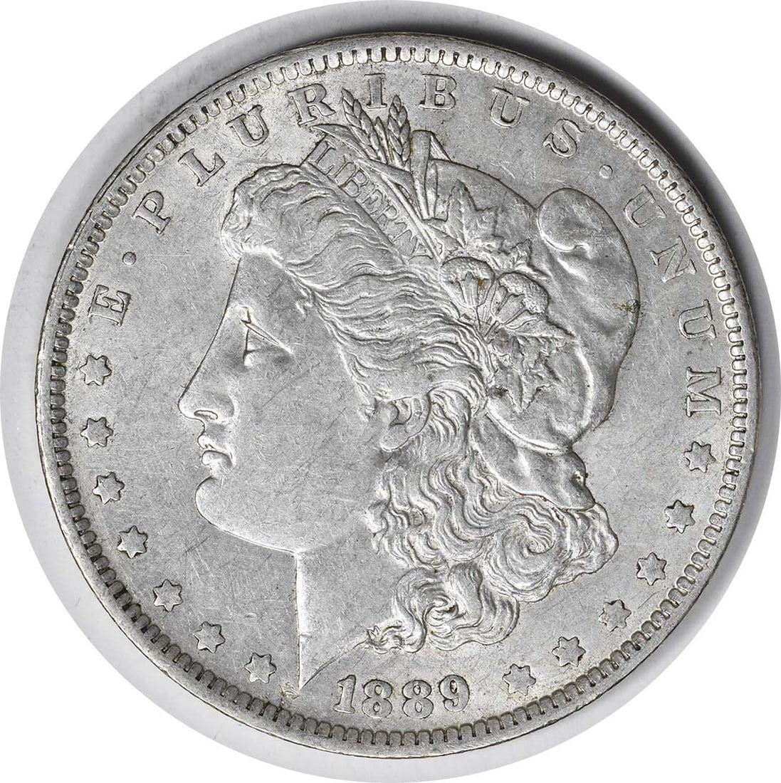 1889-O Morgan Silver Dollar VAM 2 AU Uncertified New Orleans: 1889-O Morgan Silver Dollar VAM 2 AU Uncertified New Orleans This 1889-O VAM 2 Morgan Silver Dollar is an exquisite piece for collectors, showcasing the artistry of designer George T. Morgan. The coin