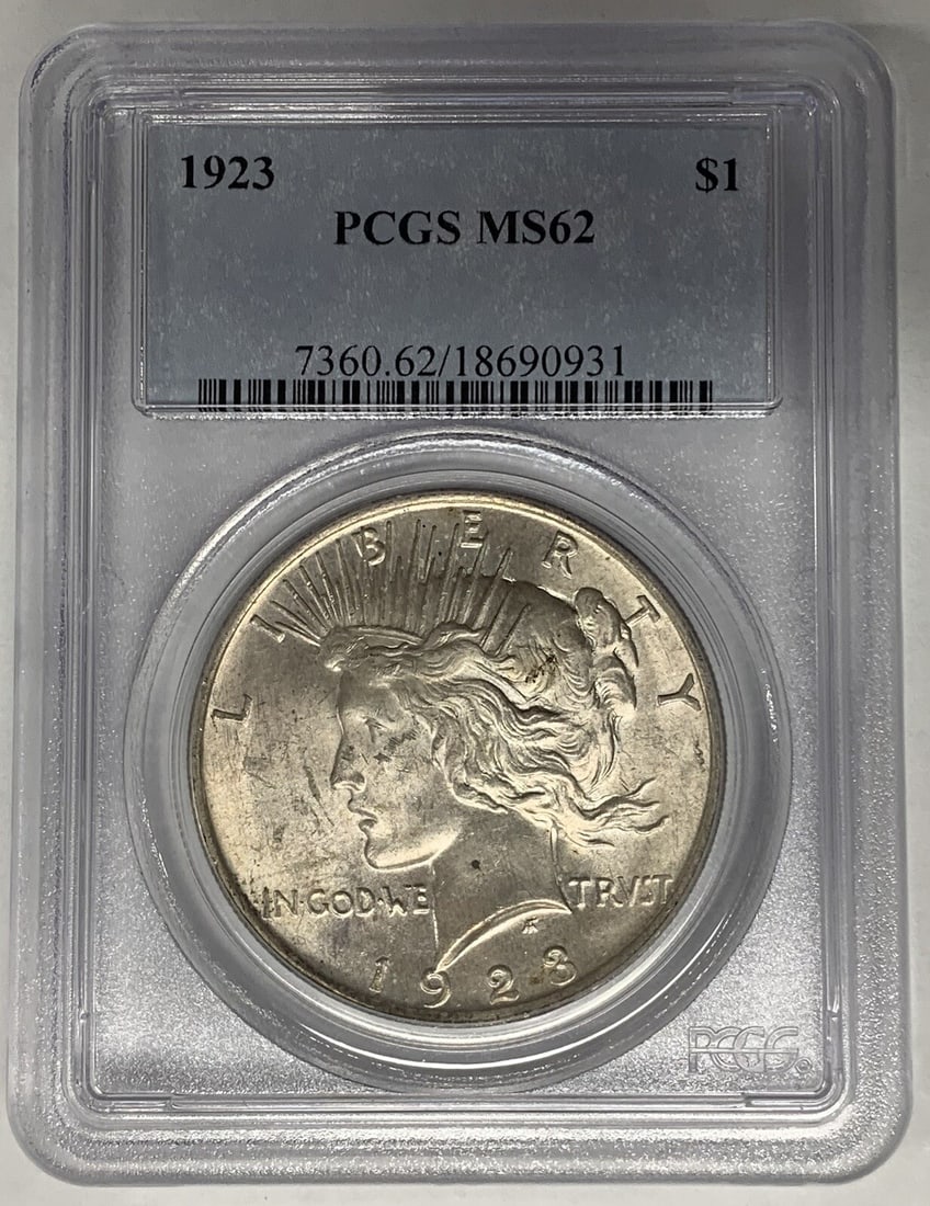 PCGS MS 62 Certified 1923 Peace Silver Dollar Uncirculated Coin: PCGS MS 62 Certified 1923 Peace Silver Dollar Uncirculated Coin This is a 1923 Peace Silver Dollar coin from the United States, graded MS 62 by PCGS. The coin is composed of silver and has a denominat
