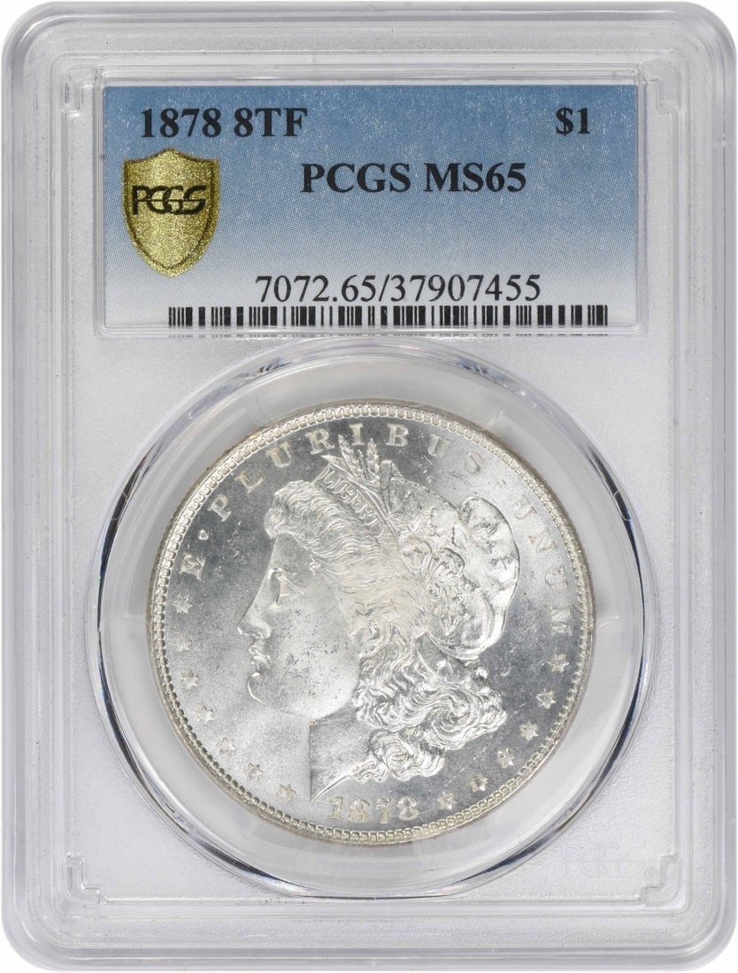 1878 Morgan Silver Dollar MS65 PCGS Uncirculated 90% Silver: 1878 Morgan Silver Dollar MS65 PCGS Uncirculated 90% Silver This 1878 Morgan Silver Dollar is a stunning piece for collectors and enthusiasts. Graded MS65 by PCGS, it showcases exceptional quality wit