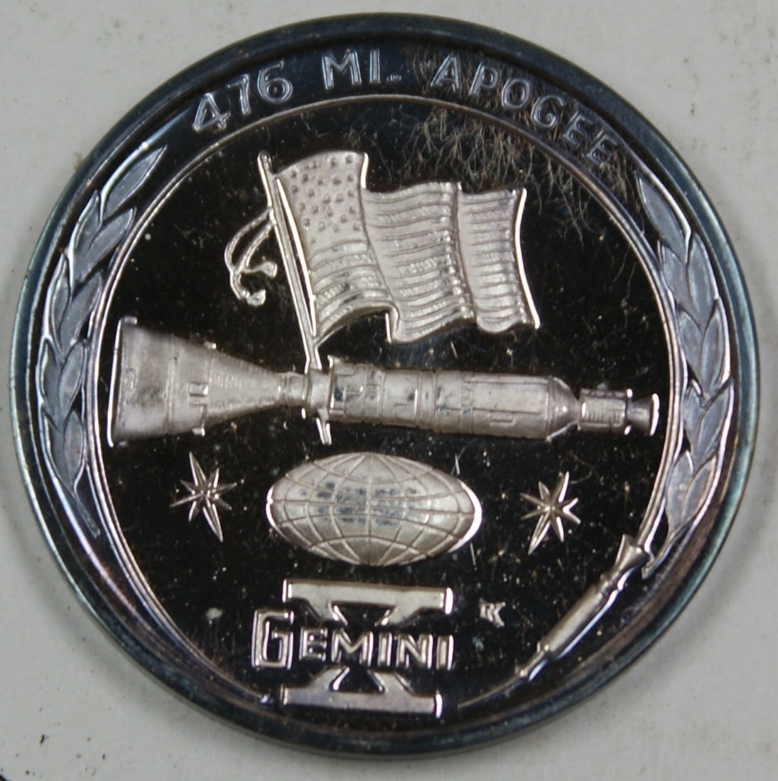 Gemini 10 Silver Commemorative Medal Celebrating American Space Mission: Gemini 10 Silver Commemorative Medal Celebrating American Space Mission This Gemini 10 commemorative silver medal celebrates the history of American men in space. The reverse side features imagery of 