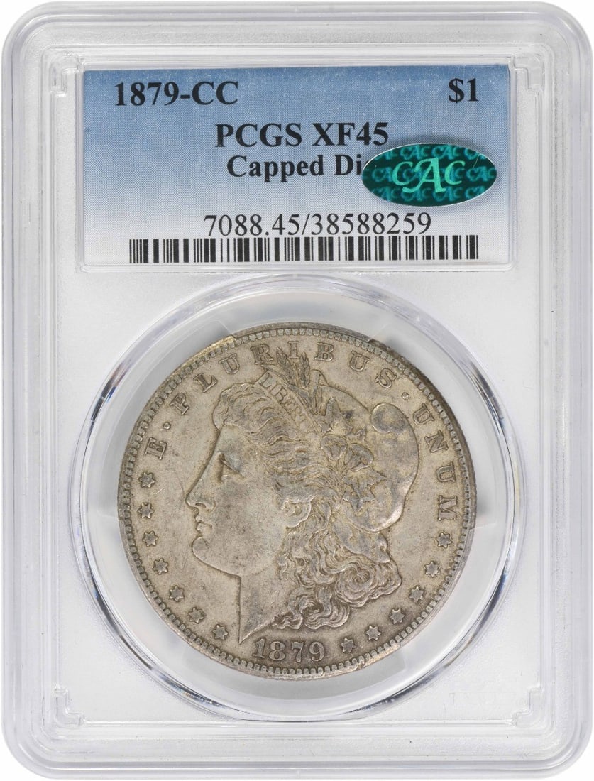 Carson City 1879 Morgan Dollar PCGS EF45 CAC Certified Silver Coin: Carson City 1879 Morgan Dollar PCGS EF45 CAC Certified Silver Coin This 1879-CC Morgan Silver Dollar features a capped die and is graded EF45 by PCGS with CAC approval. Composed of 90% silver and 10% 
