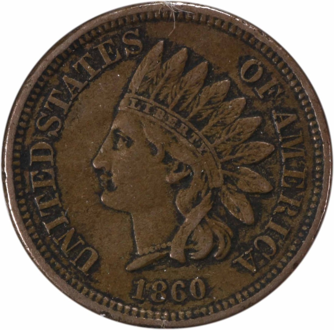 1860 Indian Head Cent Pointed Bust XF Uncertified Copper Coin: 1860 Indian Head Cent Pointed Bust XF Uncertified Copper Coin This 1860 Indian Cent features a Pointed Bust design and is graded as Extra Fine (XF). It is a circulated coin with no mint mark, made of 