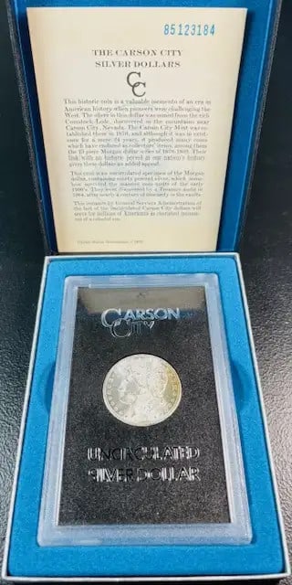 1885 CC Morgan Silver Dollar Uncirculated GSA Hoard with OGP and COA: 1885 CC Morgan Silver Dollar Uncirculated GSA Hoard with OGP and COA This 1885 CC Morgan Silver Dollar is a remarkable collectible coin from the Carson City Mint, showcasing a stunning uncirculated co