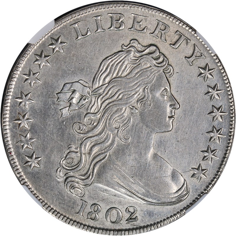 1802 Bust Dollar NGC AU Details Strong Strike Silver Coin: 1802 Bust Dollar NGC AU Details Strong Strike Silver Coin This 1802 Bust Dollar, certified by NGC with AU Details, showcases remarkable eye appeal, featuring nice luster and a strong strike. Despite b