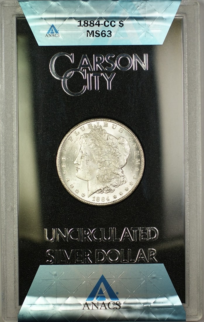ANACS MS-63 1884-CC Morgan Dollar in GSA Holder with Box and Certificate: ANACS MS-63 1884-CC Morgan Dollar in GSA Holder with Box and Certificate This 1884-CC Morgan Silver Dollar is part of the GSA Hoard and has been certified by ANACS with a grade of MS 63. Minted at Car