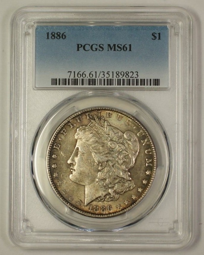 PCGS MS-61 Morgan Dollar 1886 Silver Coin With Attractive Toning: PCGS MS-61 Morgan Dollar 1886 Silver Coin With Attractive Toning This 1886 US Morgan Silver Dollar is certified by PCGS with a grade of MS-61. The coin is uncirculated and features attractive toning. 