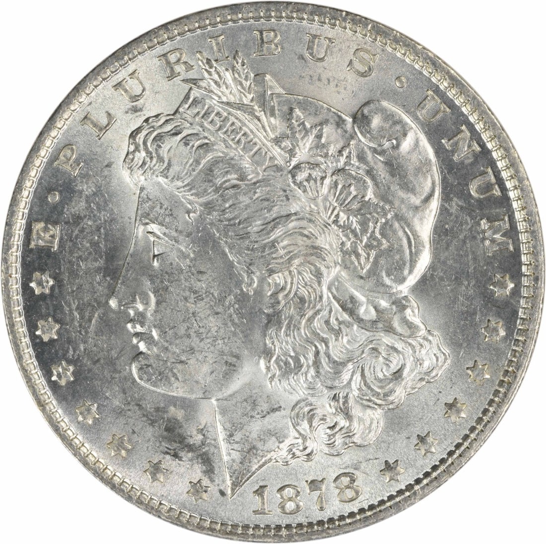 Uncirculated 1878 Morgan Silver Dollar 7 Tail Feathers Reverse 1879 No Mint Mark: Uncirculated 1878 Morgan Silver Dollar 7 Tail Feathers Reverse 1879 No Mint Mark This 1878 Morgan Silver Dollar features the 7 Tail Feathers reverse of 1879 design. The coin is composed of silver and 