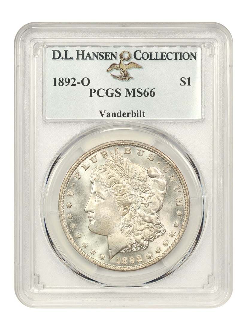 1892-O Morgan Dollar $1 PCGS MS66 Ex Vanderbilt D.L. Hansen: 1892-O Morgan Dollar $1 PCGS MS66 Ex Vanderbilt D.L. Hansen This 1892-O Morgan Dollar is a stunning example, certified by PCGS with a grade of MS66. It features a light, even sheen of golden toning an