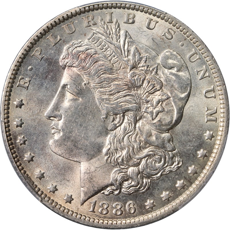 PCGS AU58 1886-O Silver Dollar with Strong Strike and Luster: PCGS AU58 1886-O Silver Dollar with Strong Strike and Luster This 1886-O Morgan Silver Dollar is certified by PCGS with a grade of AU58. The coin is struck in silver with a fineness of 0.9 and was min