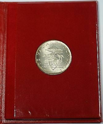 Uncirculated 1963 Silver 500 Lire Coin Vatican in Original Government Booklet: Uncirculated 1963 Silver 500 Lire Coin Vatican in Original Government Booklet This 1963 Vatican 500 Lire coin is composed of silver and remains in uncirculated condition. It comes presented in its ori