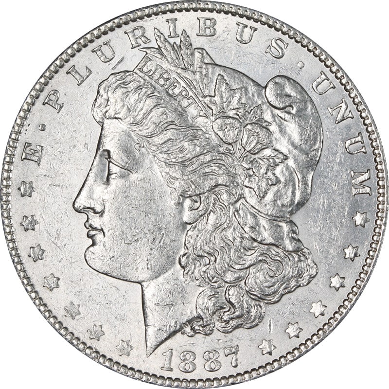 1887 Over 6 Philadelphia Morgan Dollar Silver US Coin: 1887 Over 6 Philadelphia Morgan Dollar Silver US Coin This is an 1887/6 P Morgan Silver Dollar from the United States. The coin is circulated and composed of silver with a fineness of 0.9. It is uncer